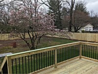 <b>Pressure Treated Wood Deck with Wood Railing and Black Aluminum Balusters 2</b>